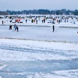 Playing hockey outside on a lake in Minneapolis<br />photo credit: minnpost.com